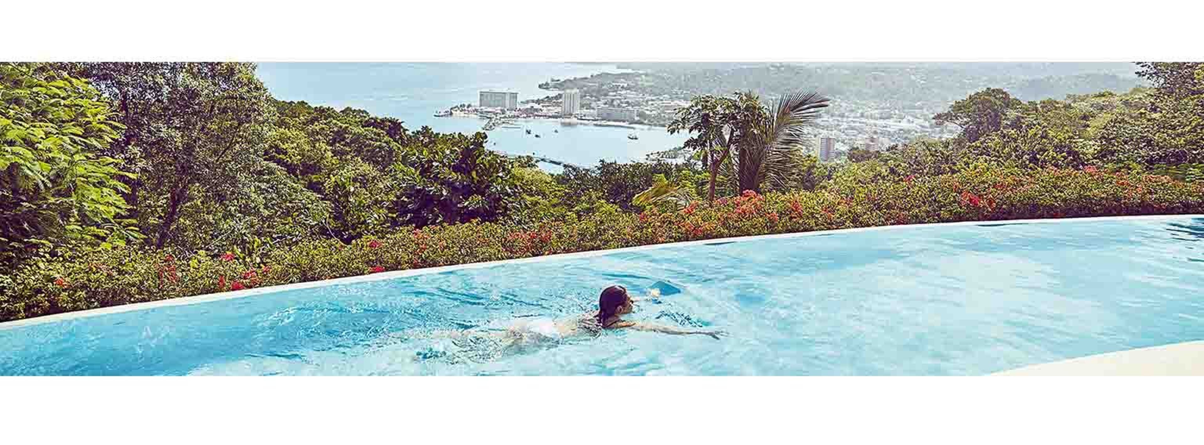  Woman swimming in pool 